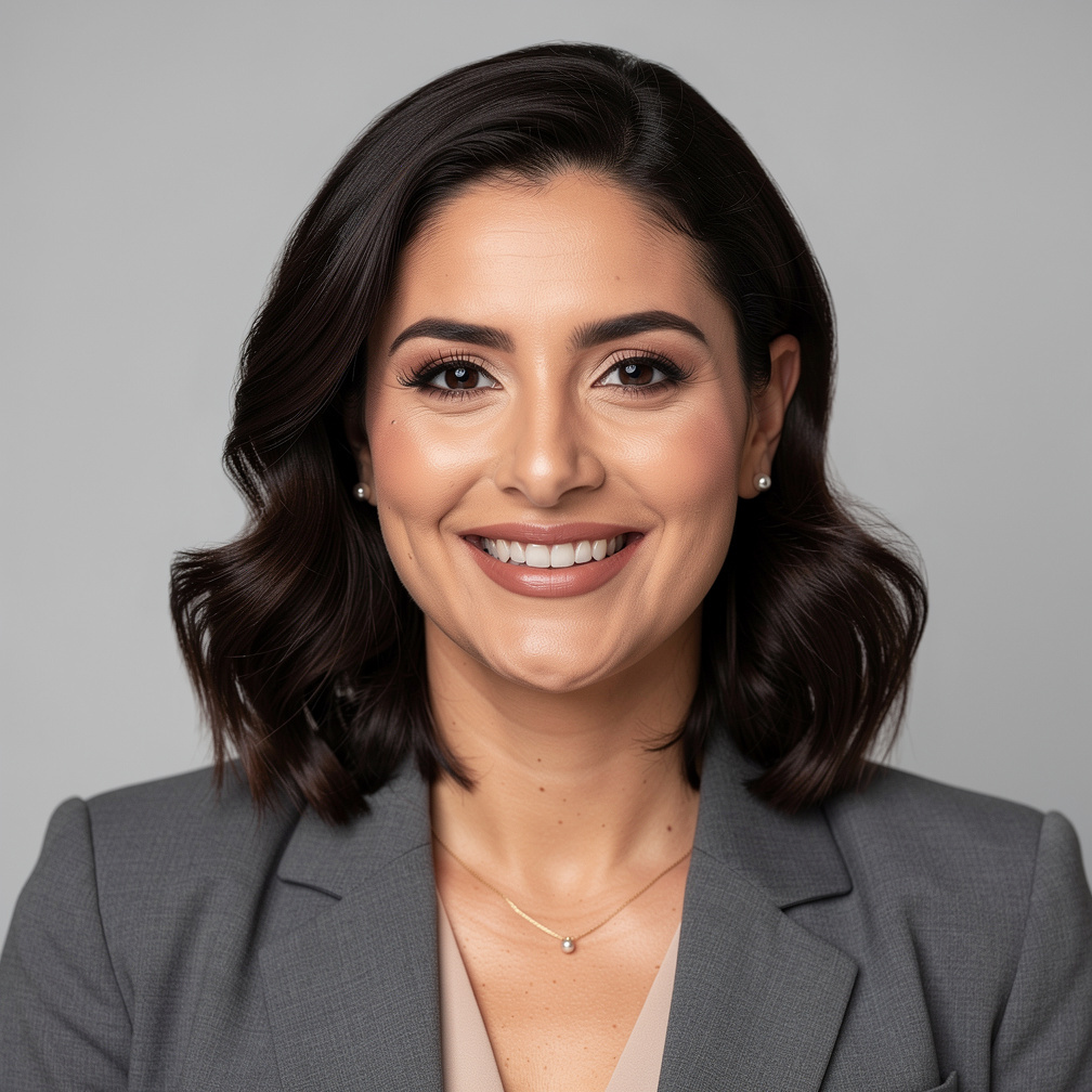 Portrait of a woman production coordinator smiling in a studio